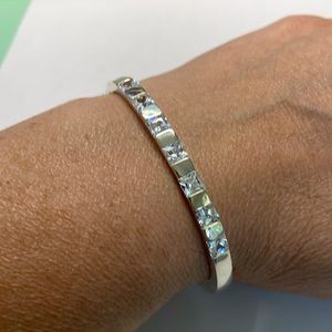 Rarely worn bangle with seven square crystals.